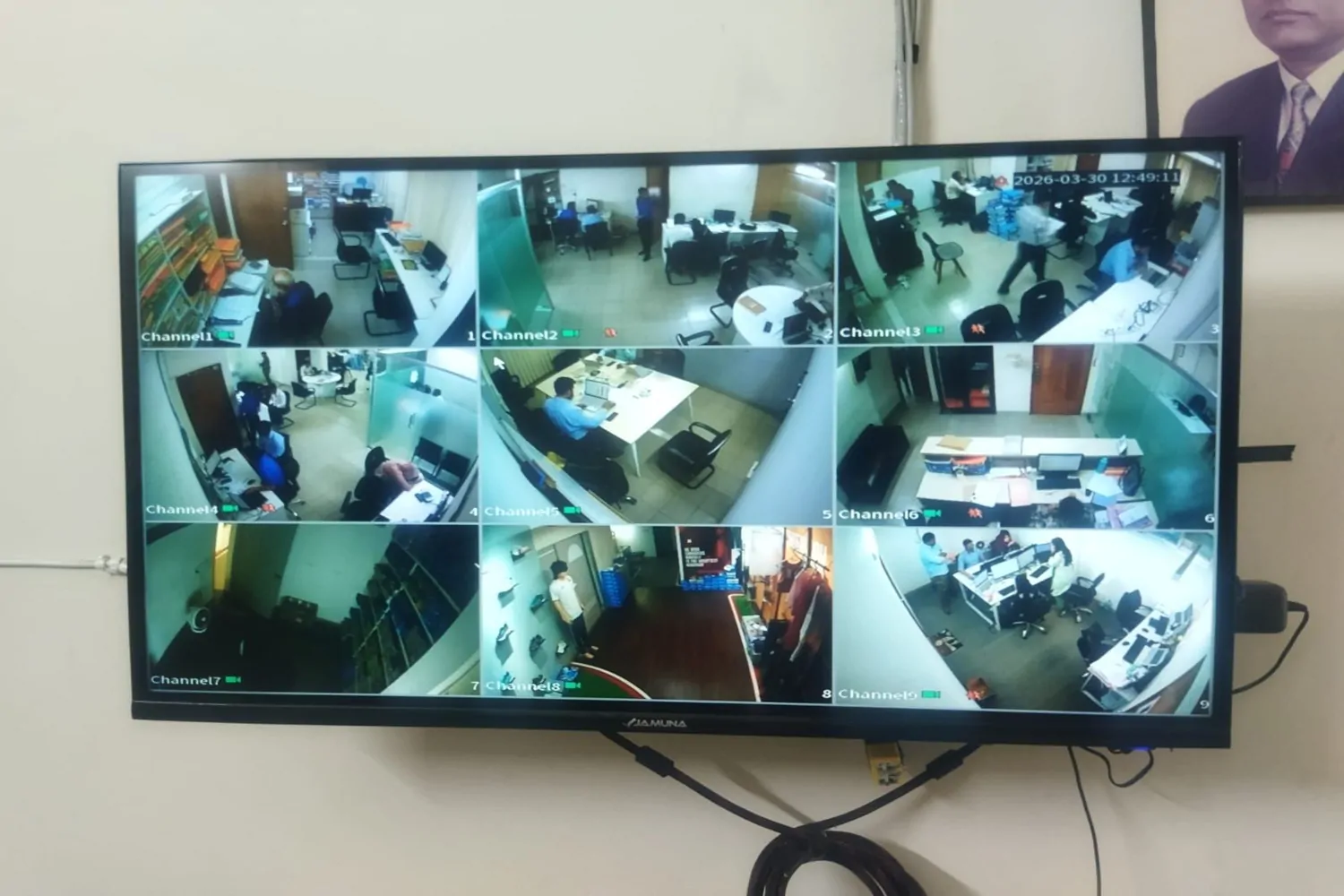 CCTV live monitoring display showing multiple camera views installed in Gulshan Niketon office